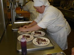 pastry chef plating desserts