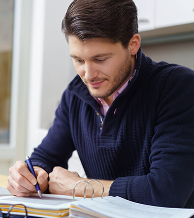 male student studying for adult basic education class in broward county public schools