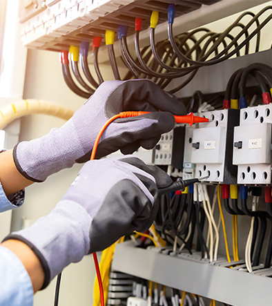 Electrician checking wiring