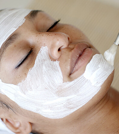 young woman getting a facial